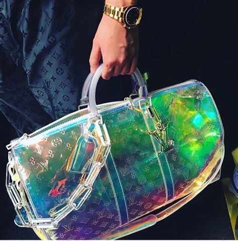 Whats more, the materials holographic blue tint reflects changes in light, creating novel chromatic variations. . Louis vuitton holographic bag